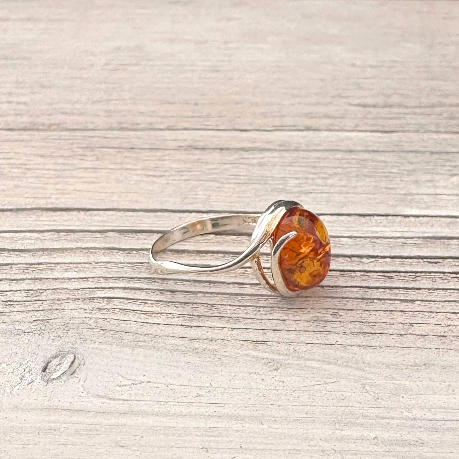 Genuine Baltic amber ring with polished amber stone