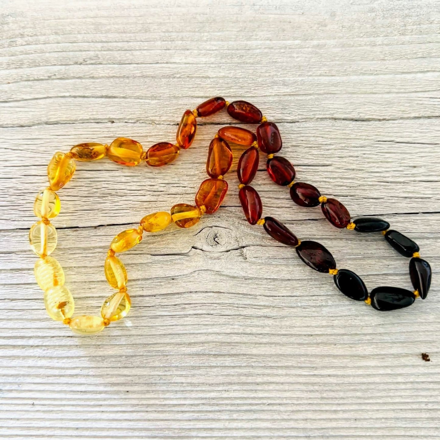 Polished amber teething necklace