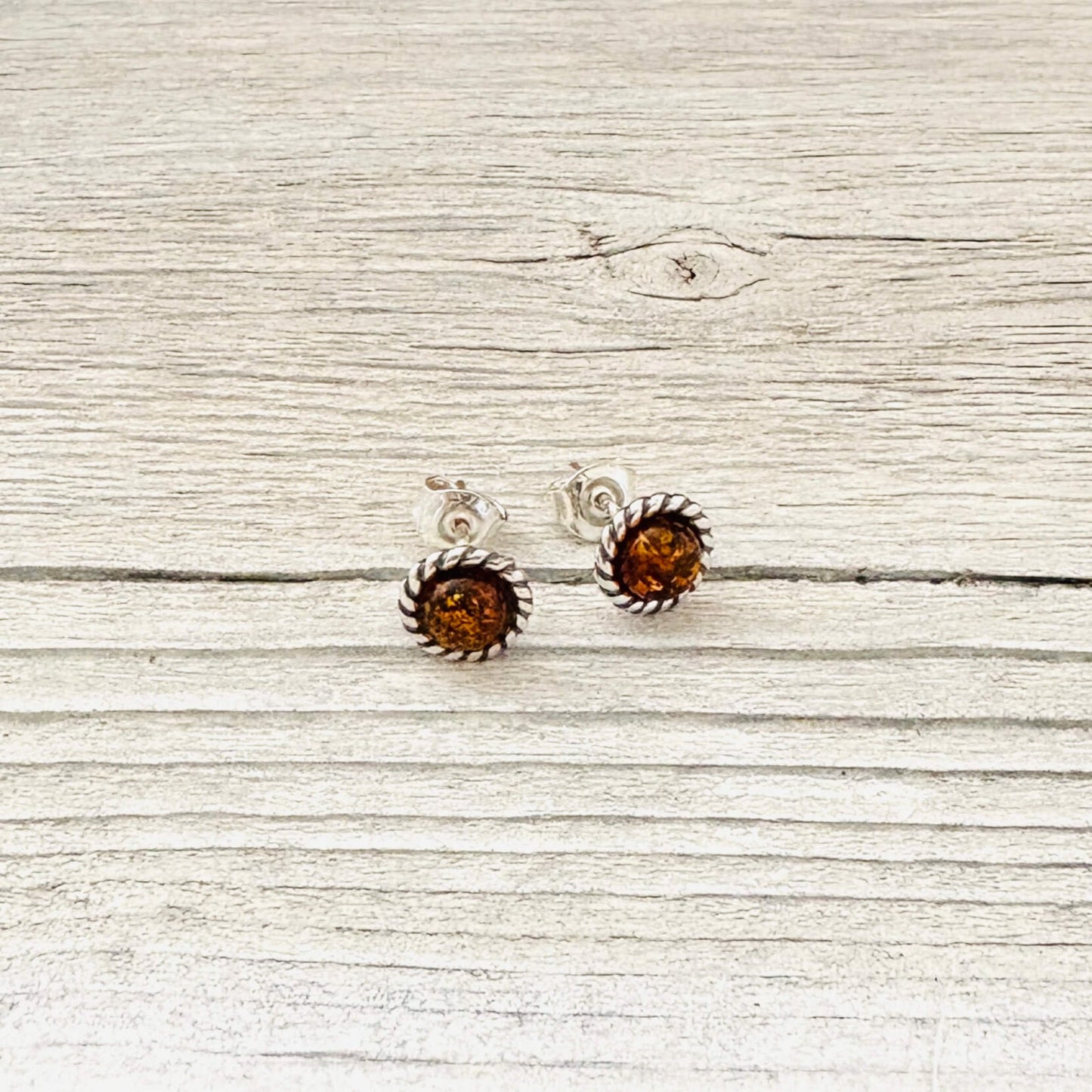 round amber cognac earrings set in sterling silver