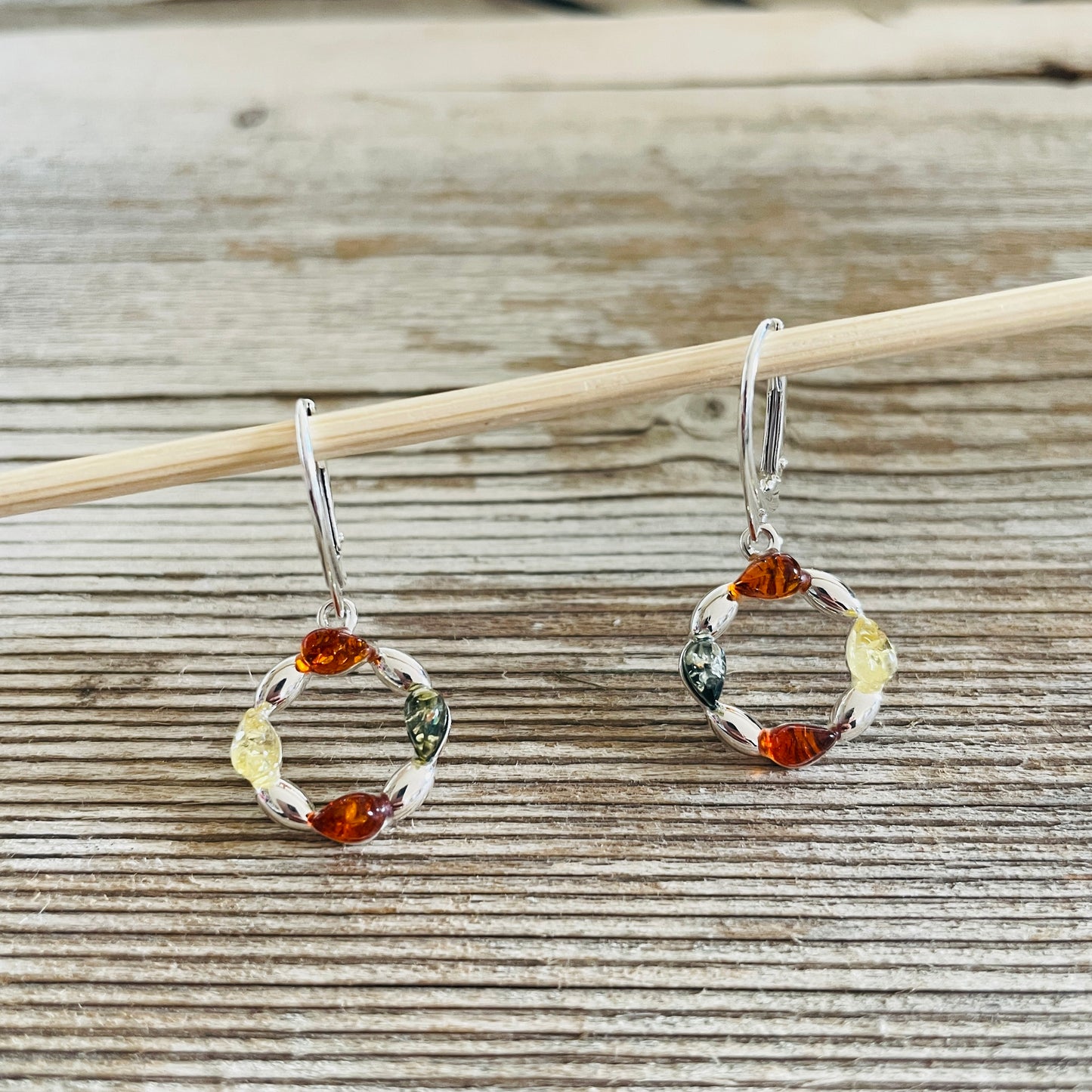 lever back sterling silver earrings with green cognac and yellow amber stones