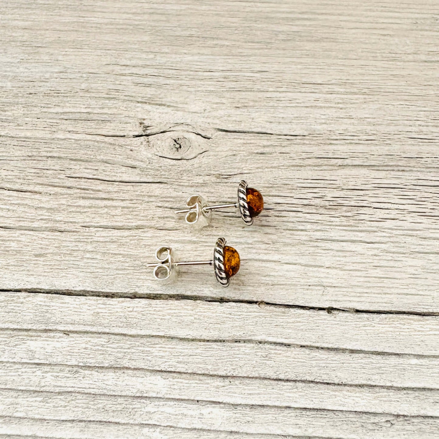 round shaped cognac amber stud earrings