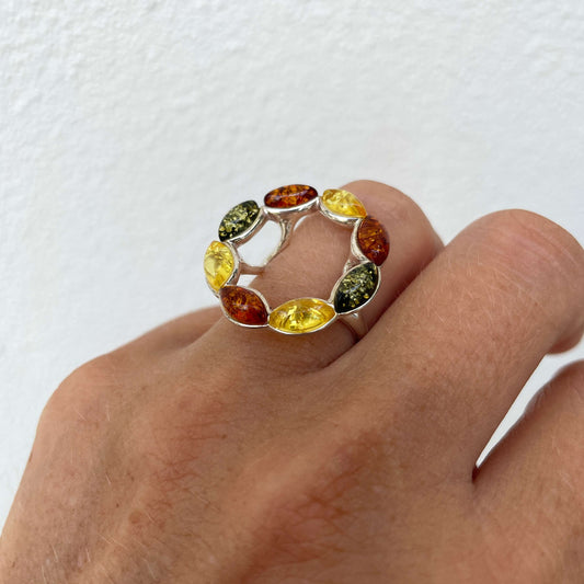 round shaped mixed coloured amber ring set in sterling silver