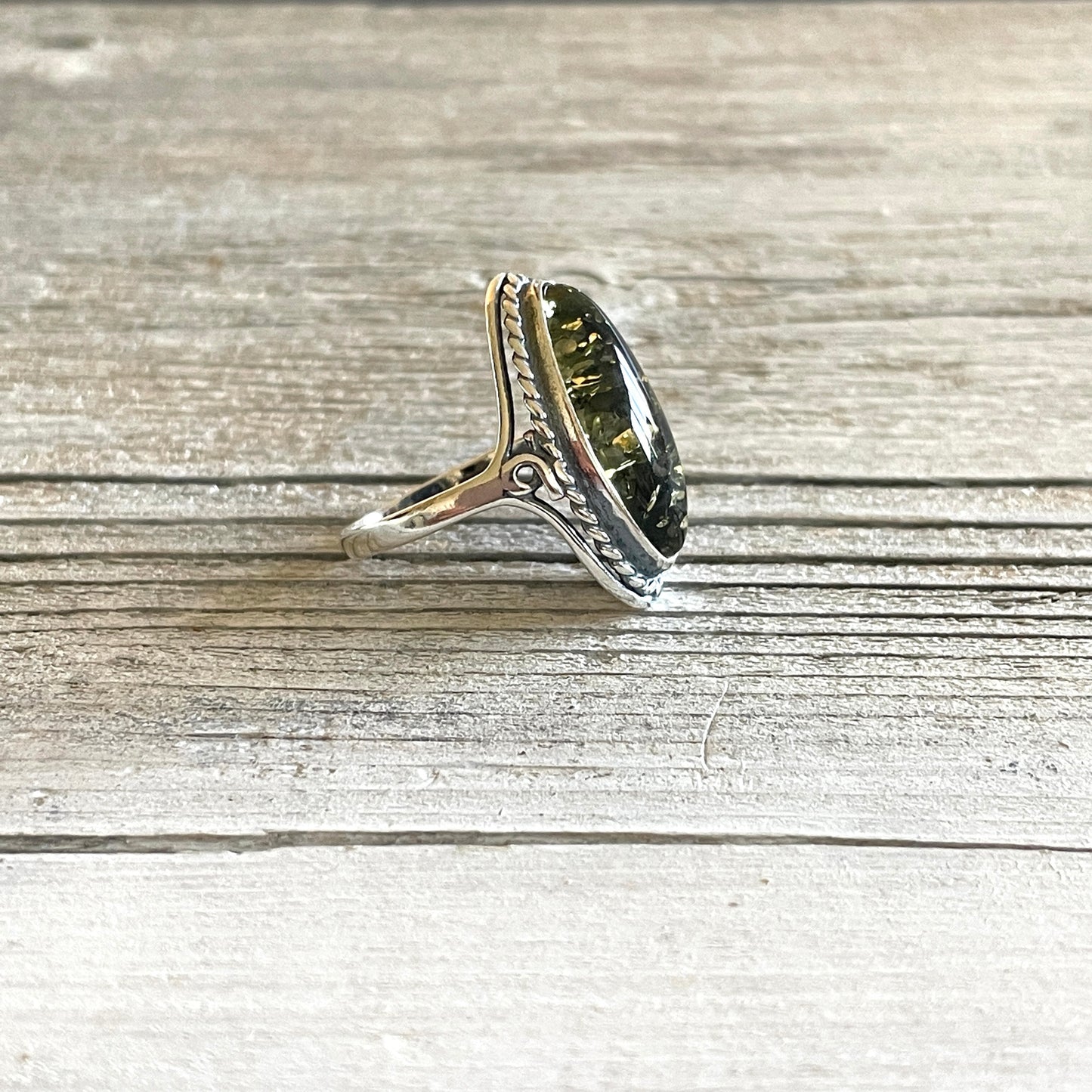 oval shaped green amber sterling silver ring left side