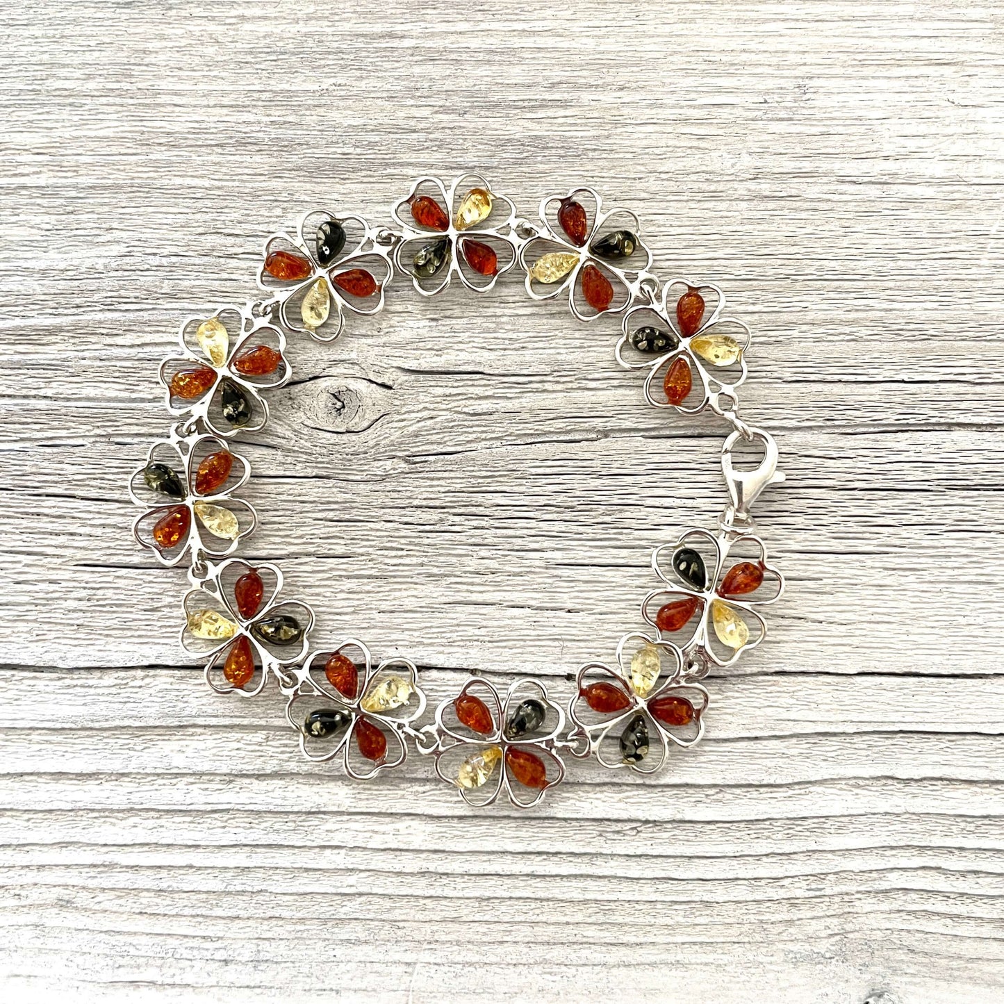 flower shaped amber and sterling silver bracelet