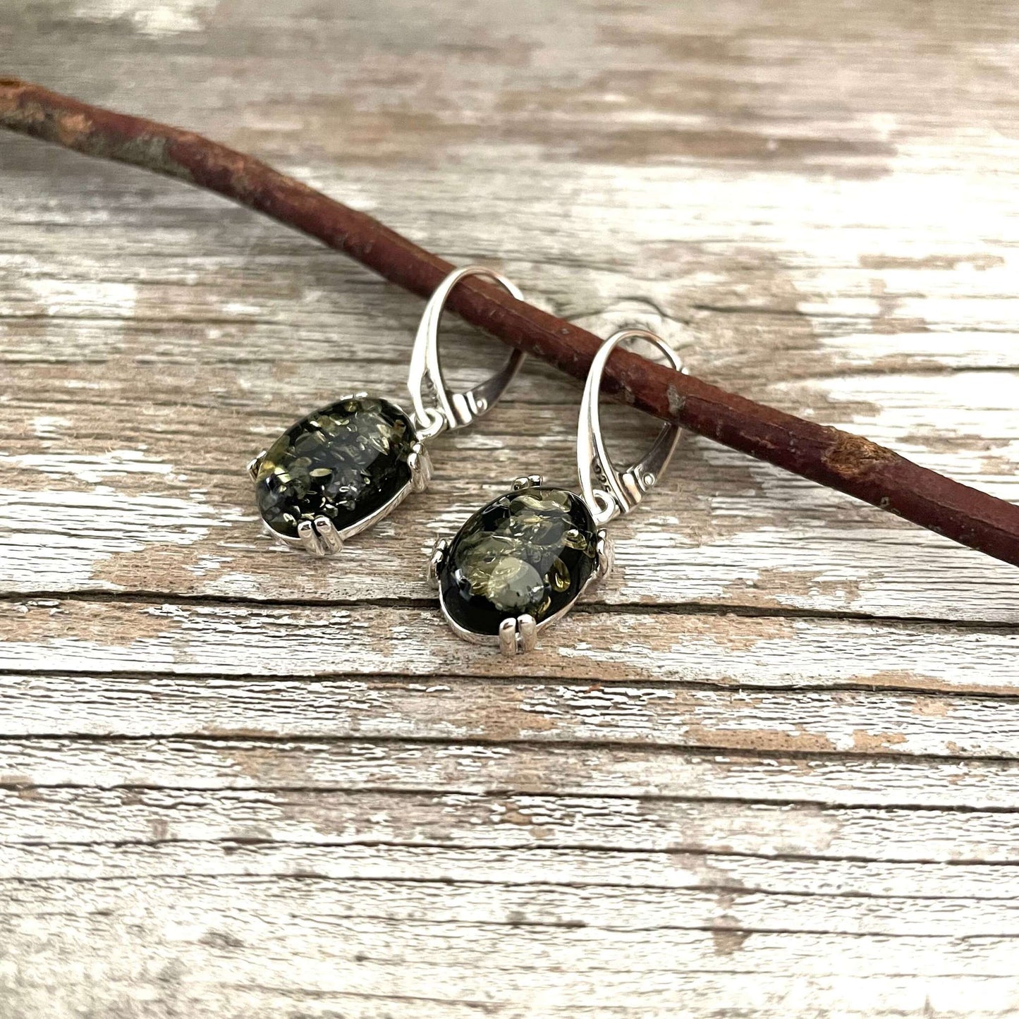 polished green amber sterling silver earrings