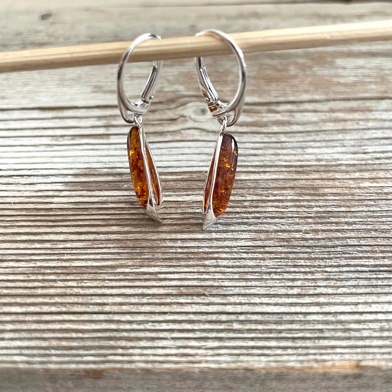 oval shaped cognac amber sterling silver earrings