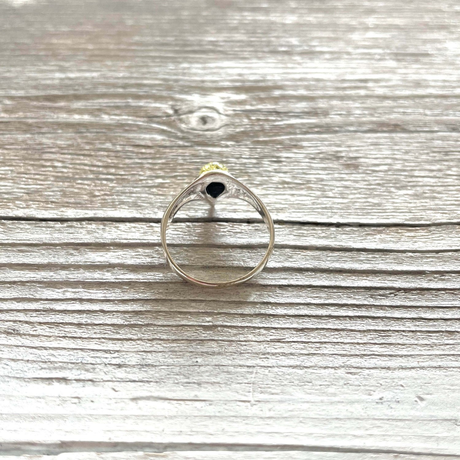 tear drop shaped green amber ring set in sterling silver back side