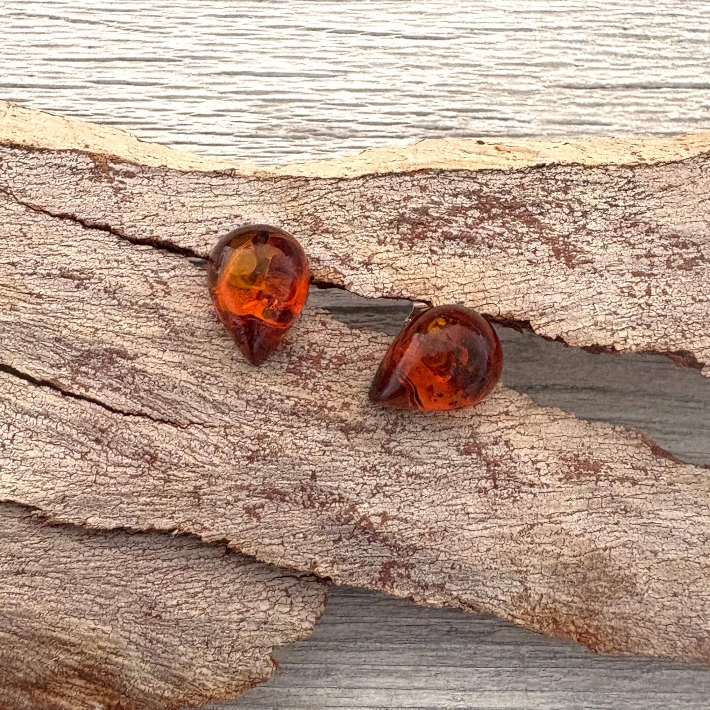 Amber teardrop shaped amber stud earrings