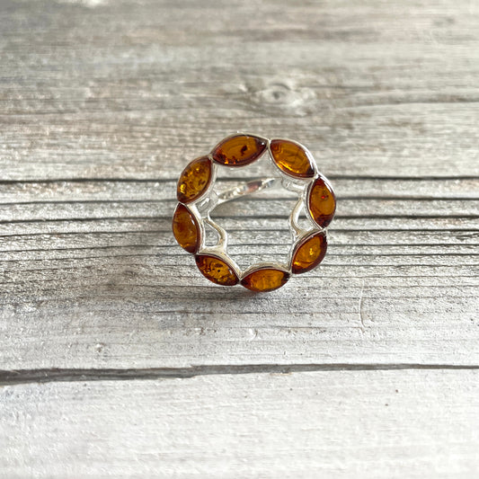 round cognac amber ring set in sterling silver front side