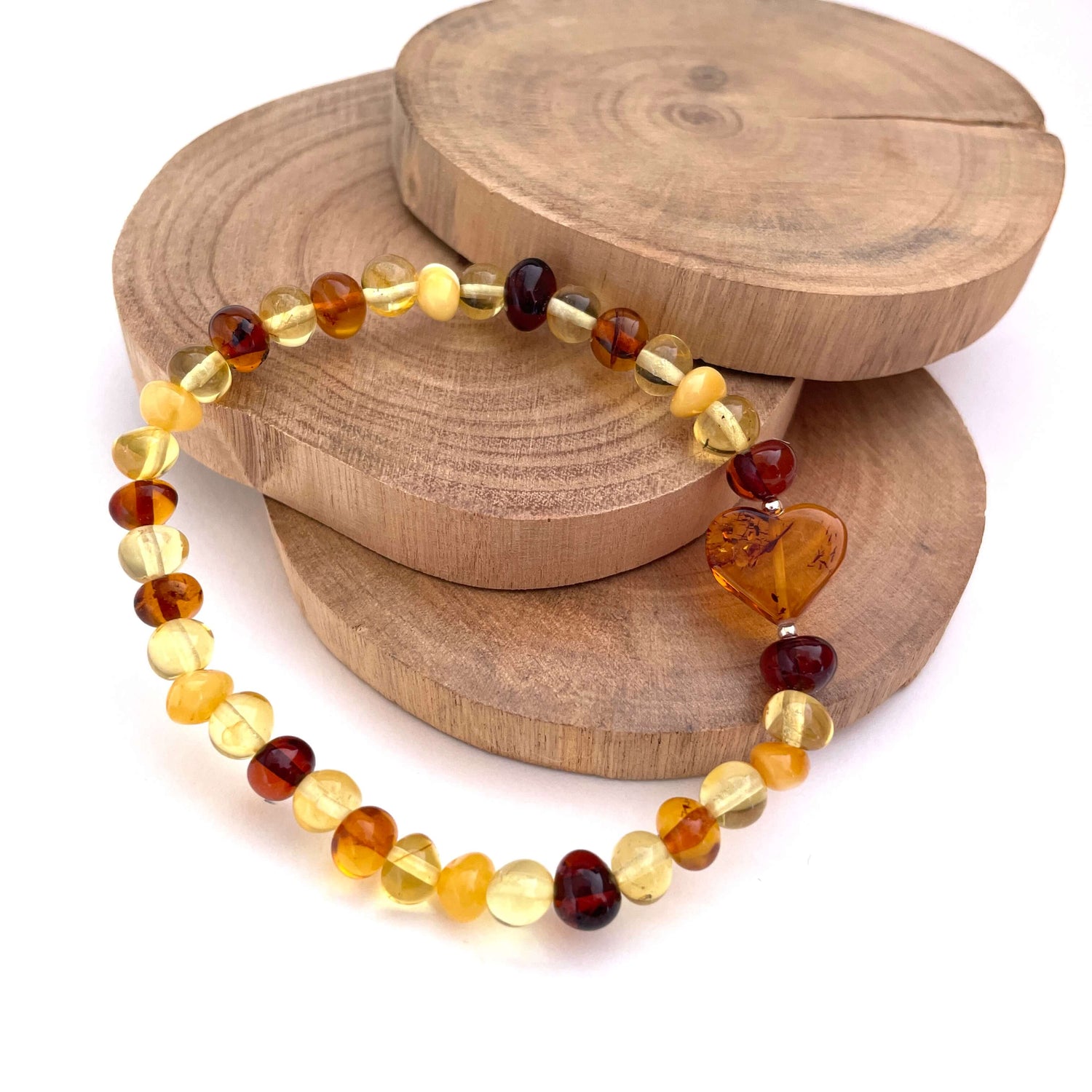 honey, yellow and cognac amber beaded bracelet with cognac coloured love heart