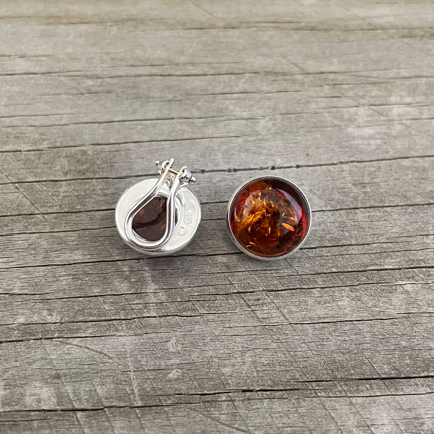 round clip on amber earrings back and front