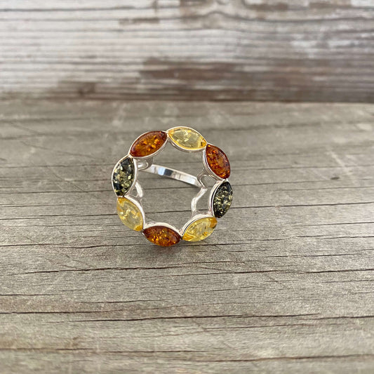 round shaped mixed coloured amber ring set in sterling silver