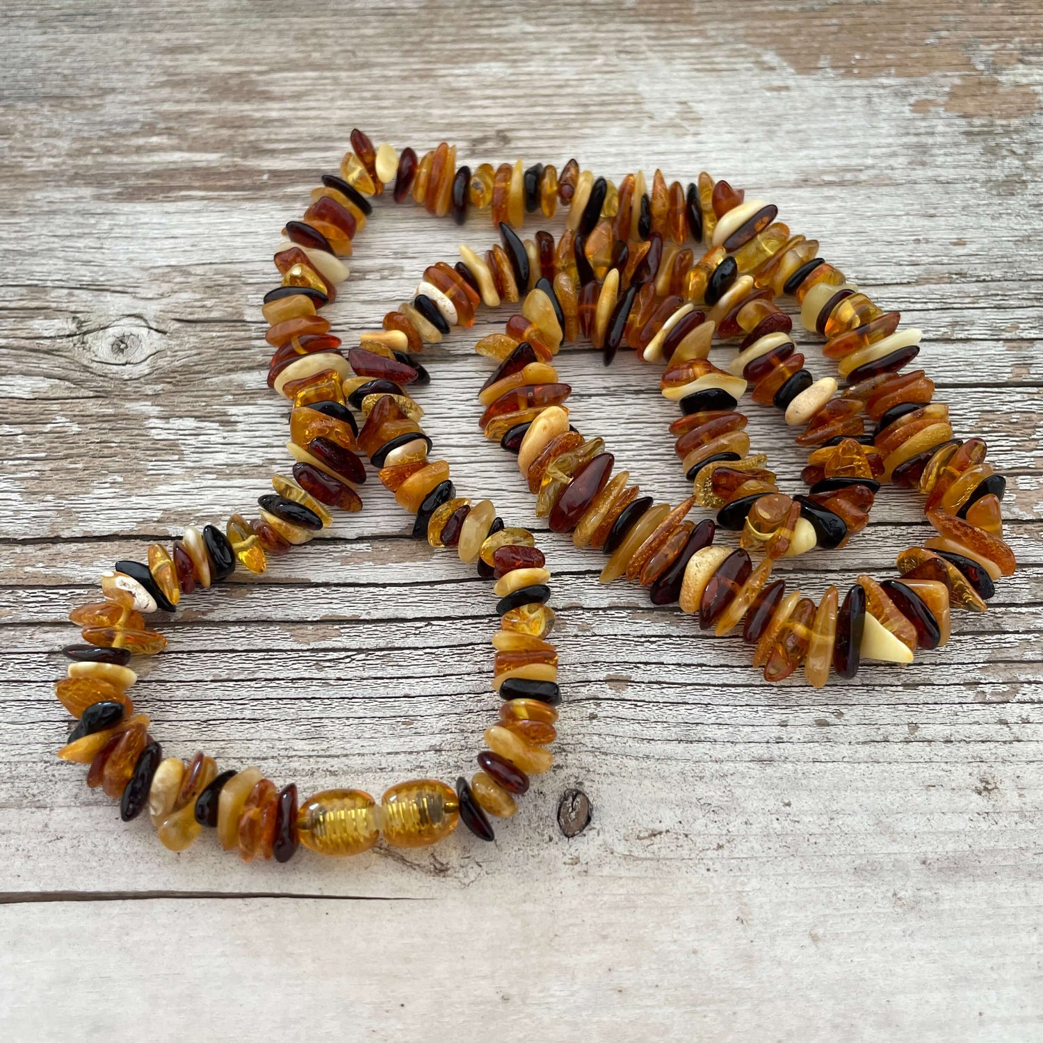 Multi coloured polished beaded amber necklace