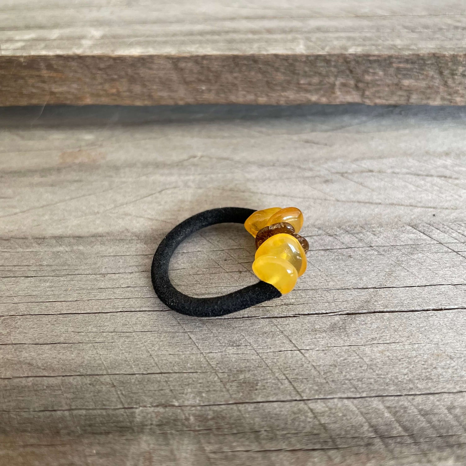 baltic amber mixed coloured ring with black band