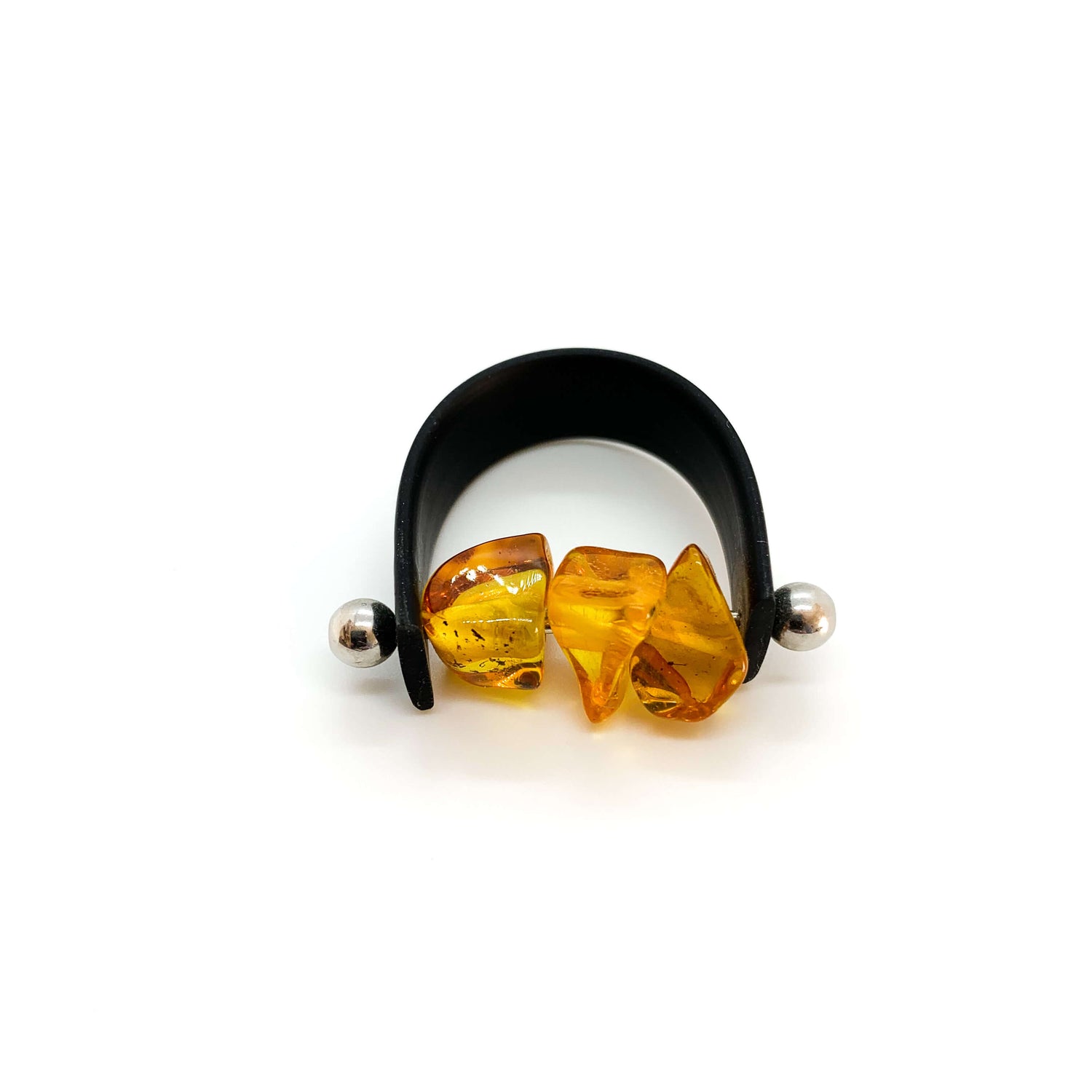 polished cognac amber with a leather black band