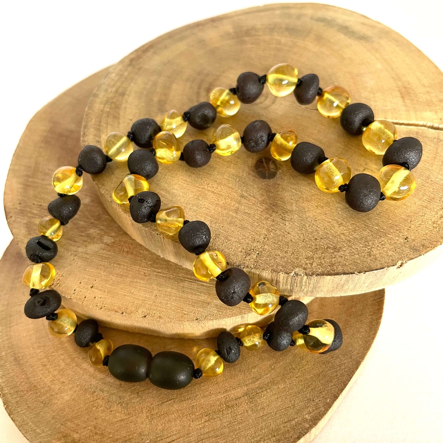 yellow and dark amber beaded baby necklace