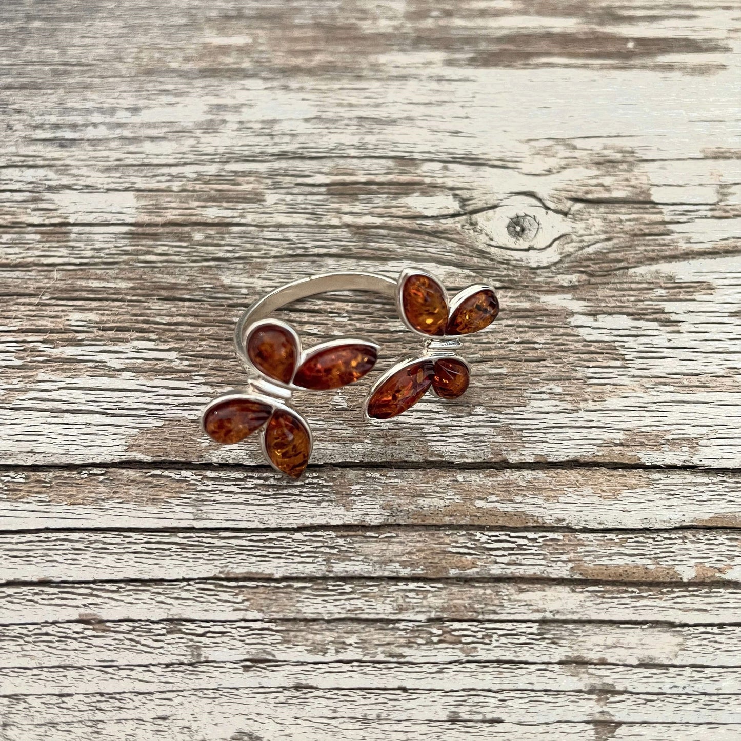 butterfly shaped adjustable cognac coloured amber ring 