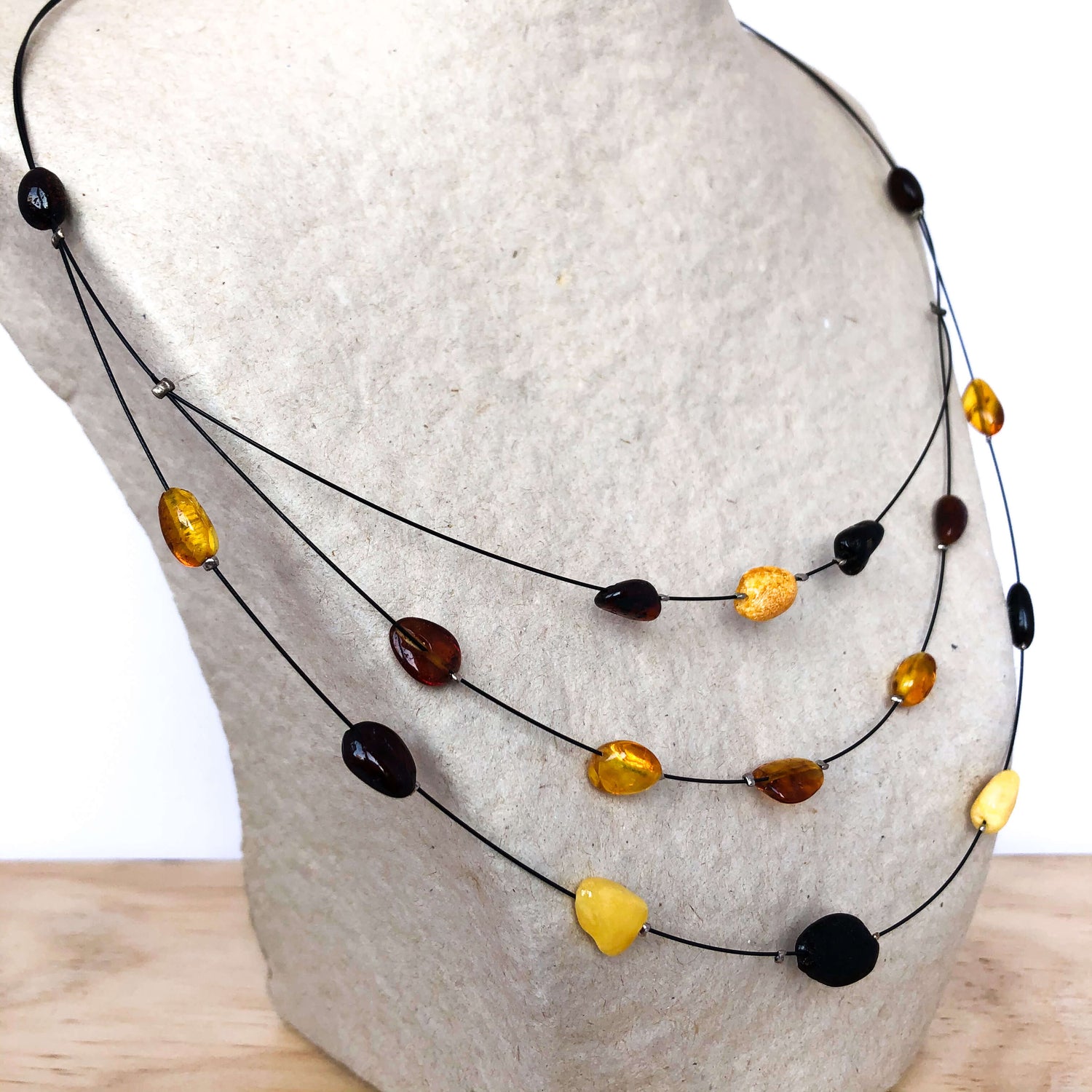 three strand mixed amber necklace on wire