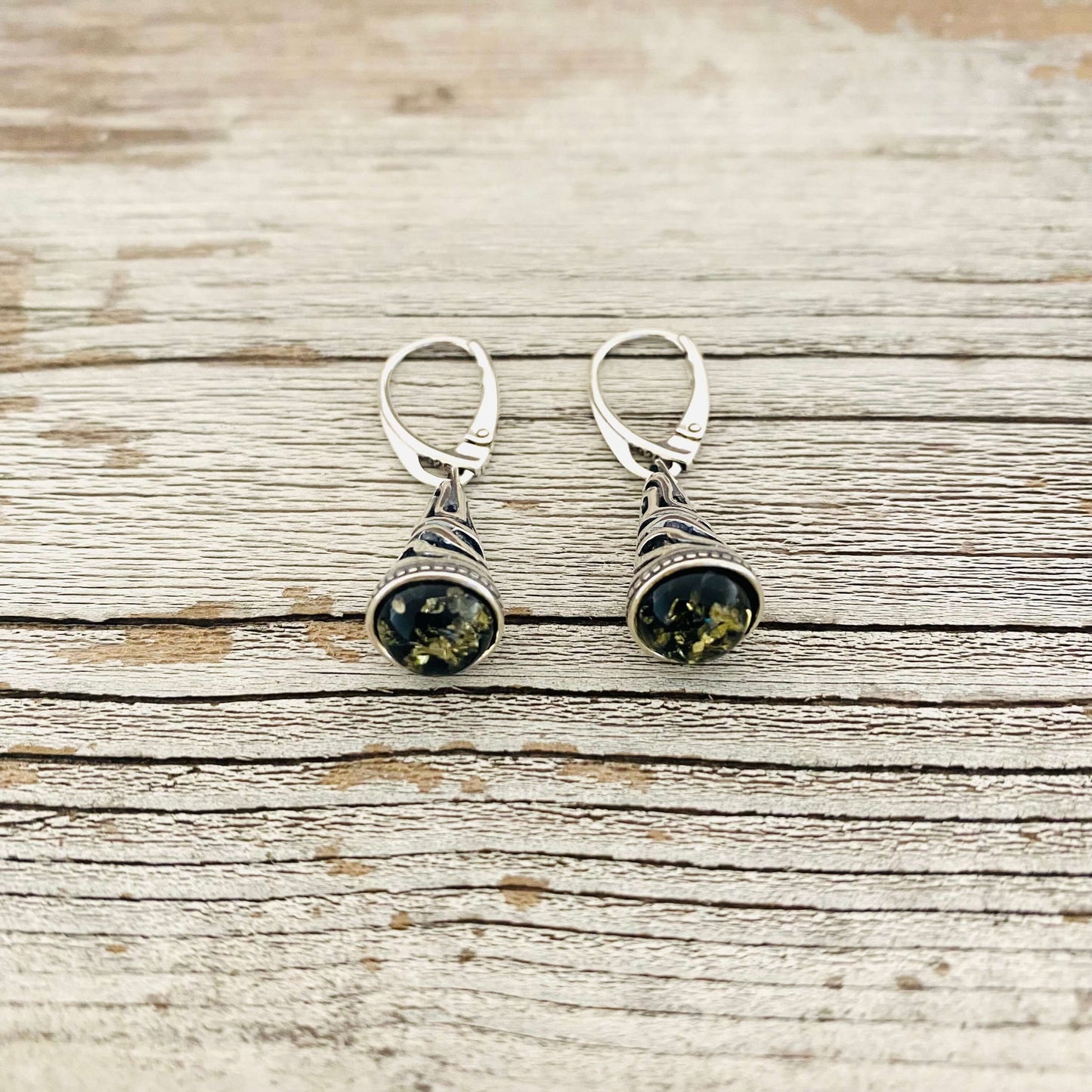 green amber and silver dangling earrings