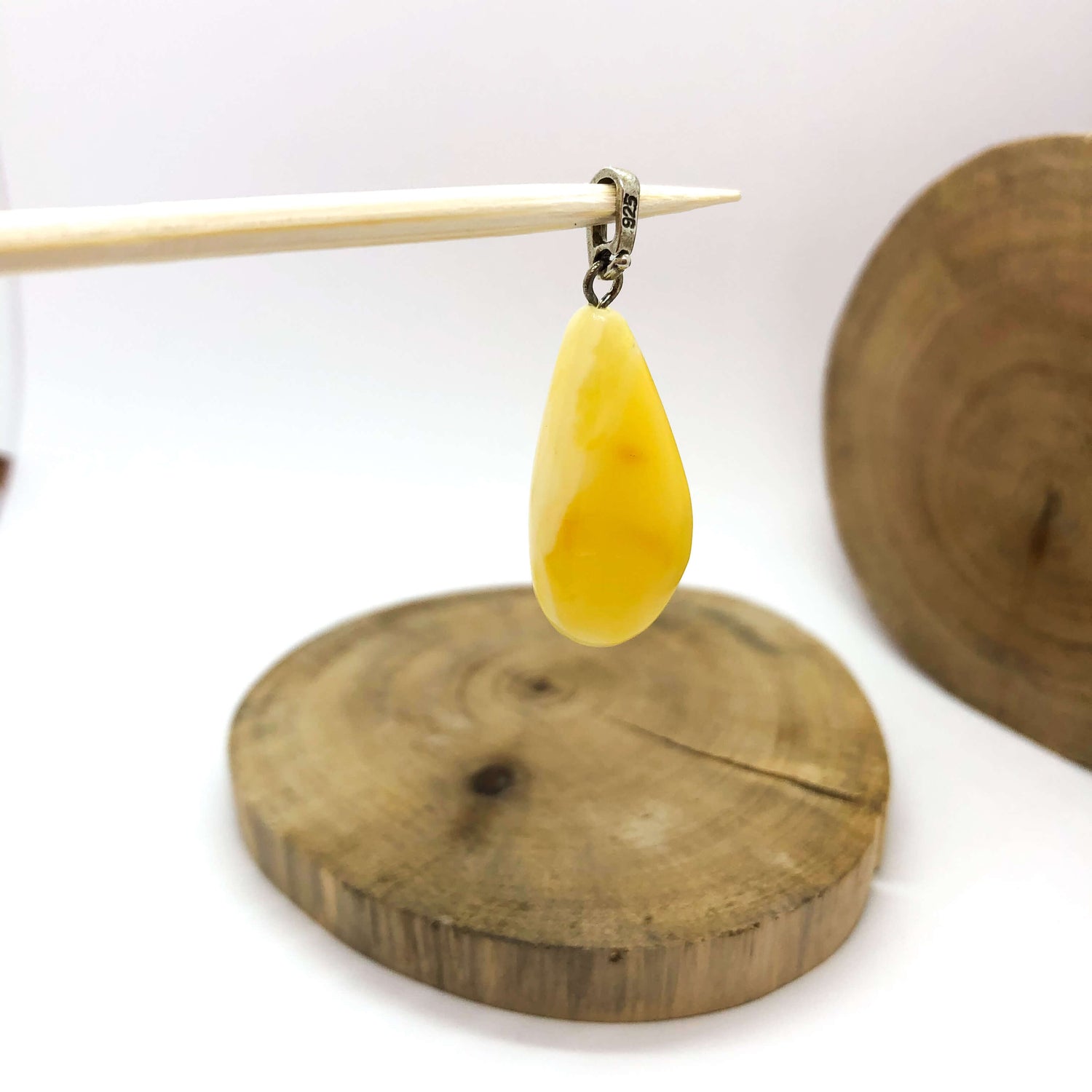 Drop White Baltic Amber Pendant set in Sterling Silver