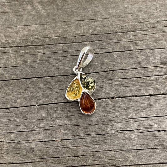 green, yellow and cognac amber pendant set in sterling silver
