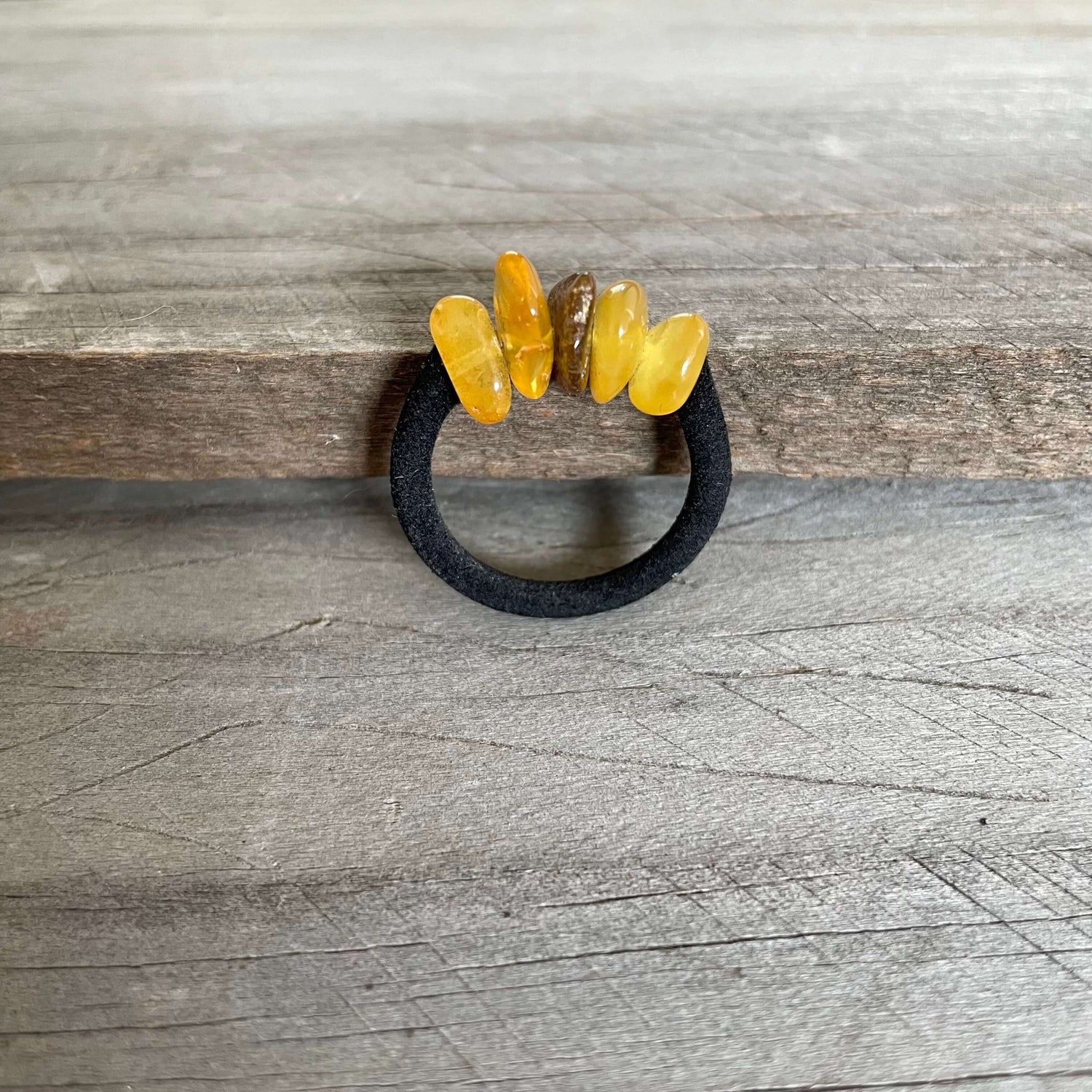 baltic amber mixed coloured ring with black band