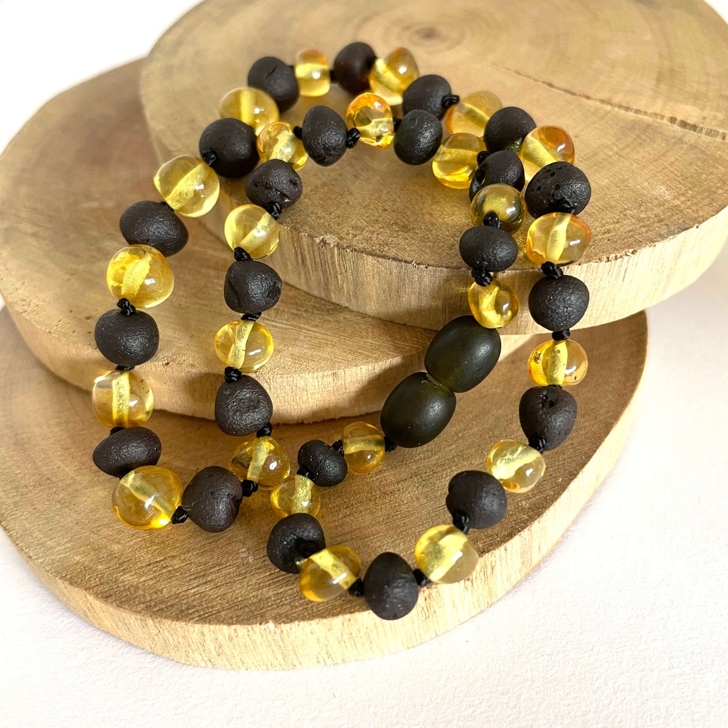 yellow and dark amber beaded baby necklace