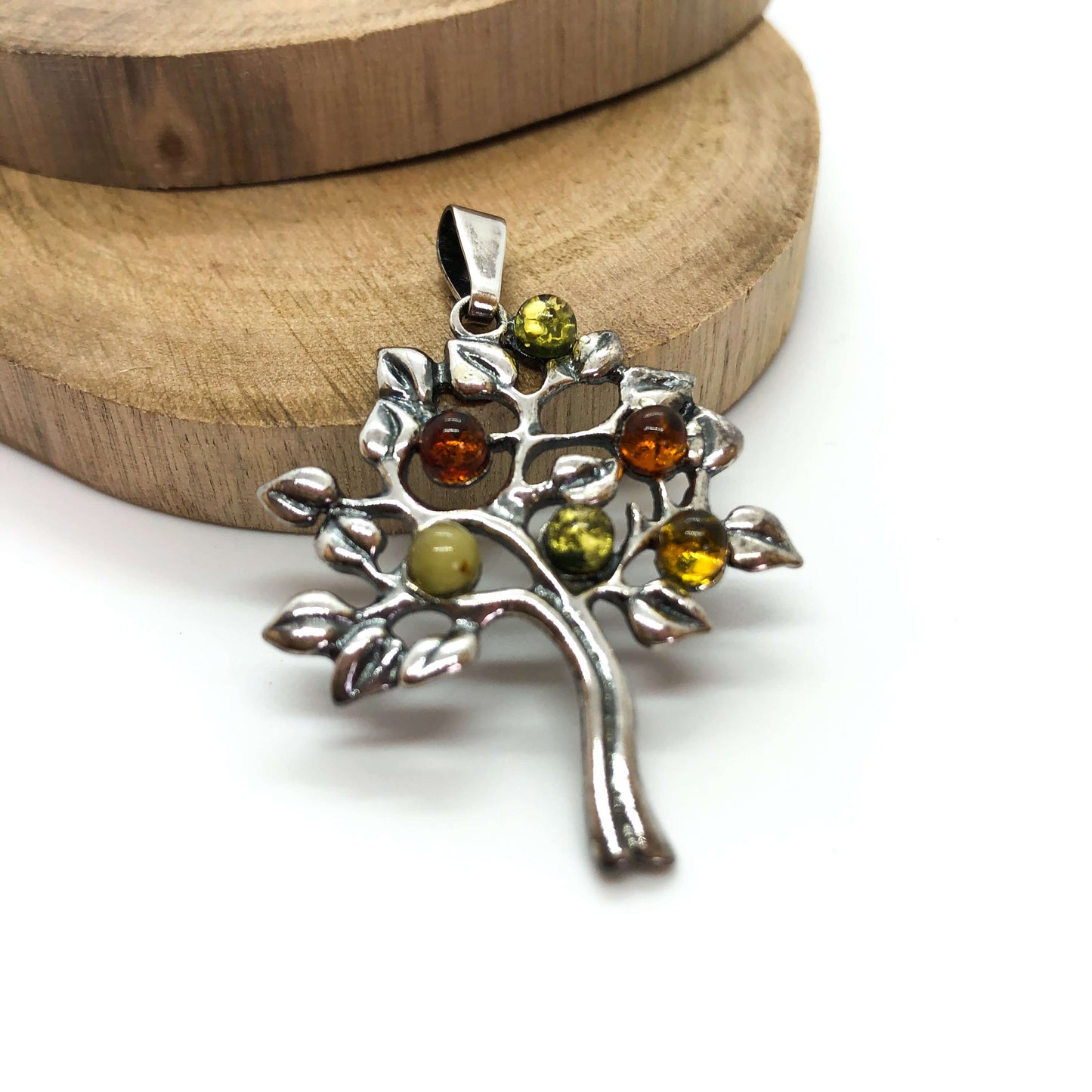 tree of life sterling silver pendant with green, butterscotch and cognac amber