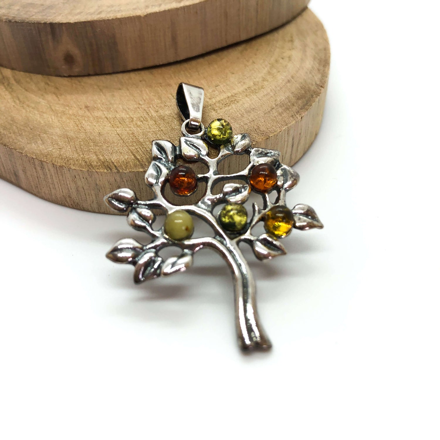 tree of life sterling silver pendant with green, butterscotch and cognac amber