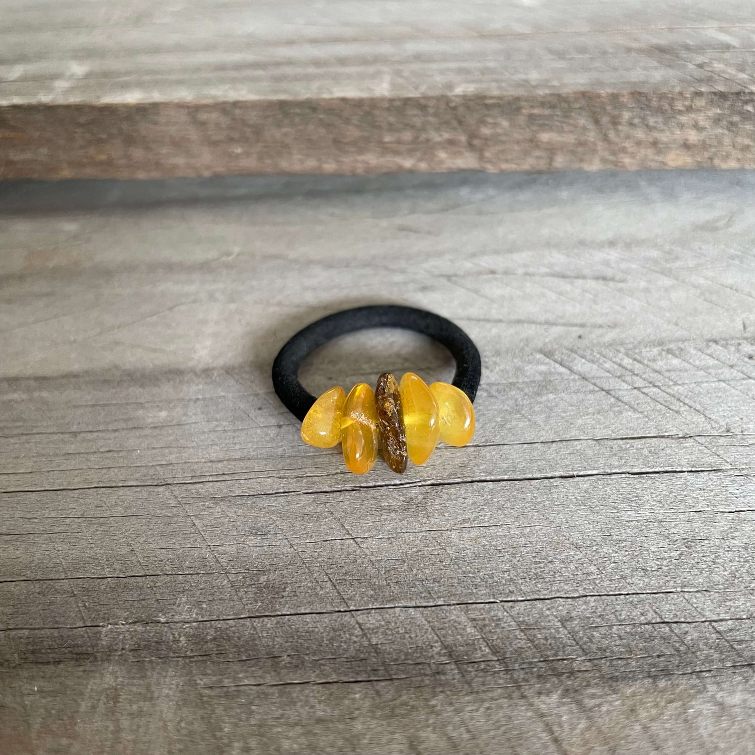 baltic amber mixed coloured ring with black band